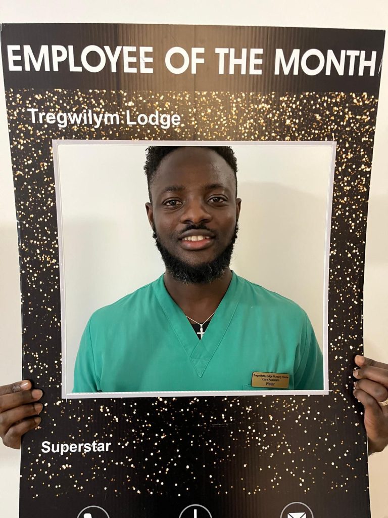 Peter and Adedolapo — Employees of the Month, October 2025